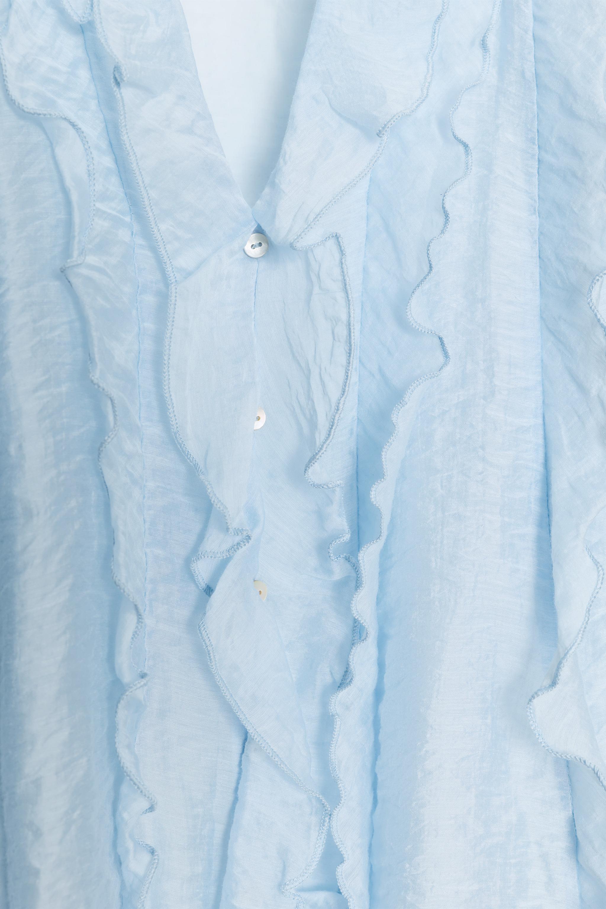 BLOUSE À VOLANTS ET POIS